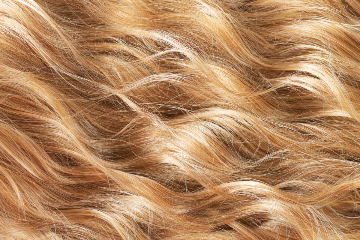 This gorgeous blonde shade is a favorite of 2024 hair color trends: honey blonde is irresistibly feminine.